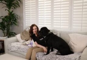 [A happy Fetch! Pet Care client and caregiver]