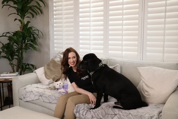 [A happy Fetch! Pet Care client and caregiver]