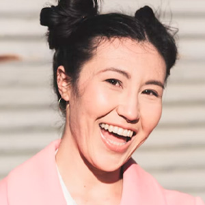 headshot of a person smiling